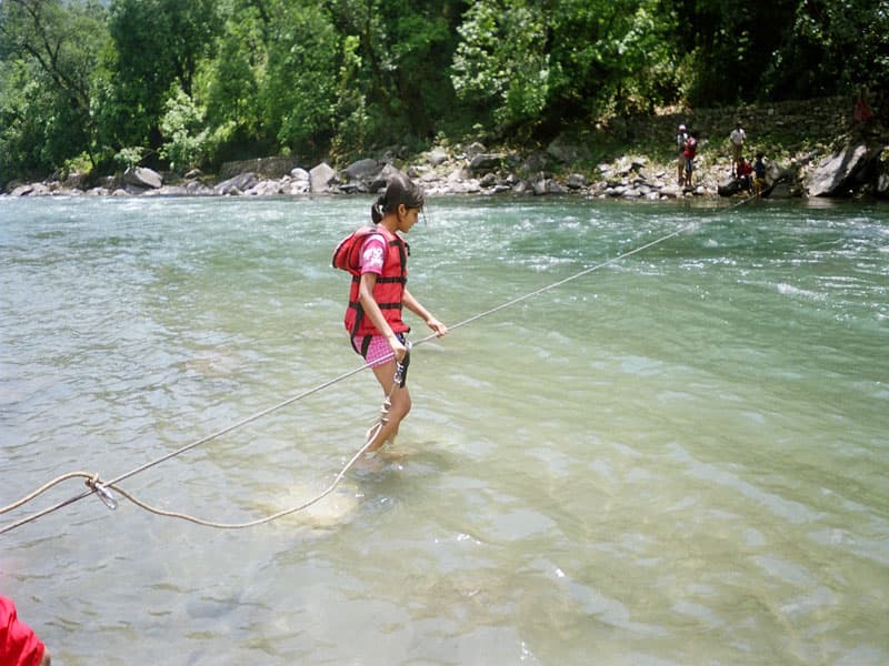 Mountain stream wading and river-crossing adventure near Chakrata Camps & Cottages