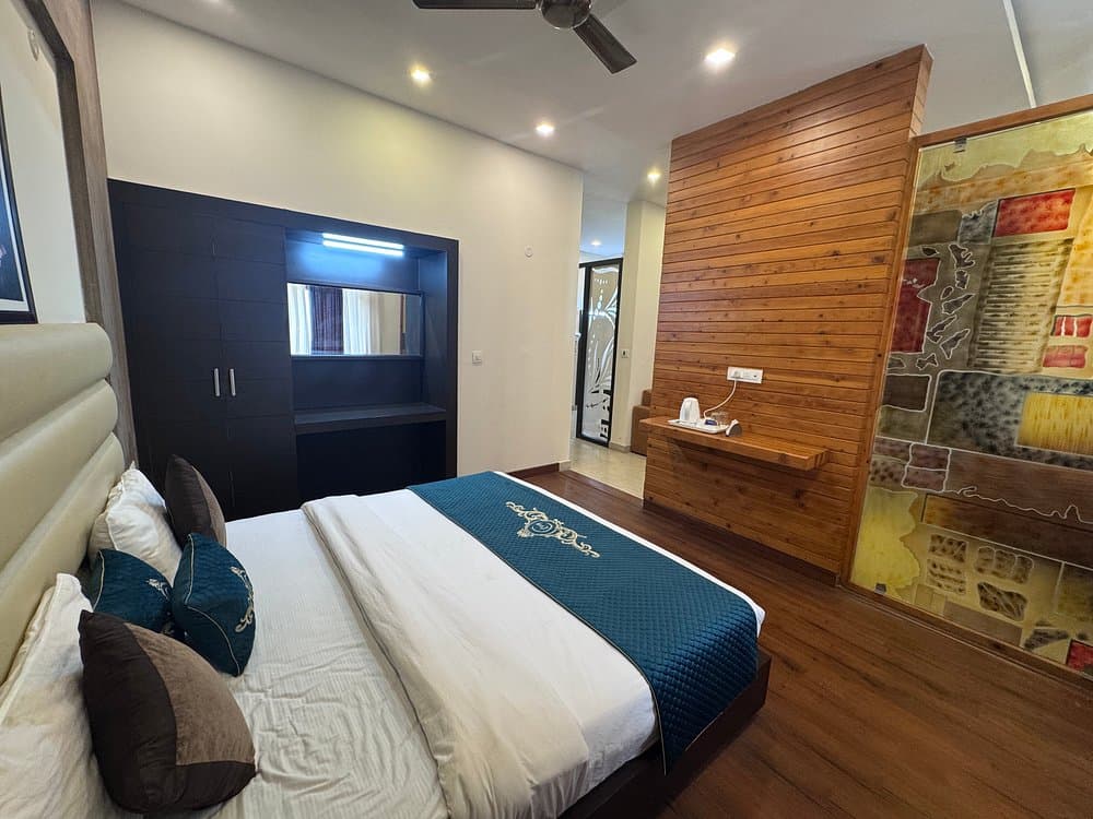 Executive Suite room with large picture windows and cushioned lounge seating
